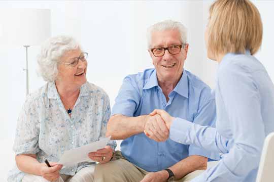 Patients talking with their audiologist